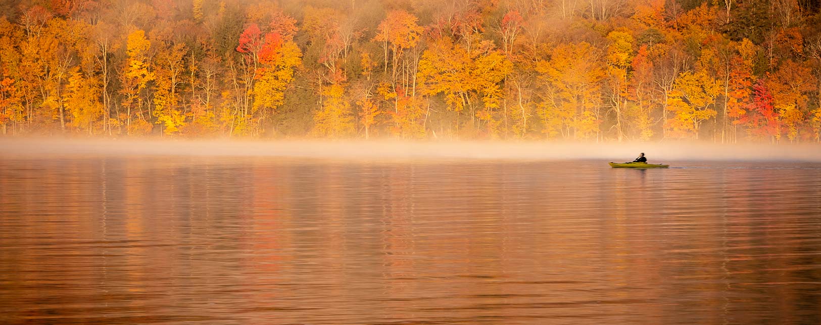Fall kayaking on Piseco Lake