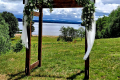 Wooden archway with views of lake