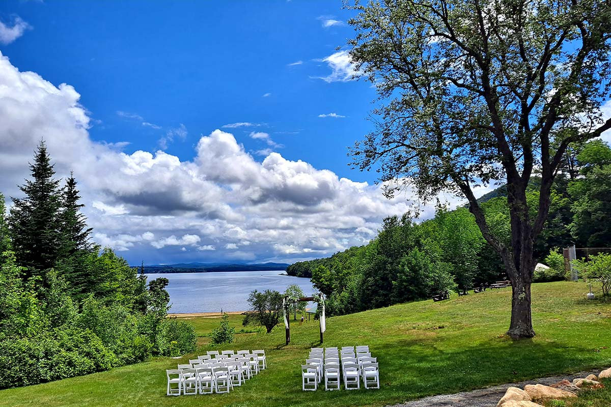 Lawn wedding with views of lake