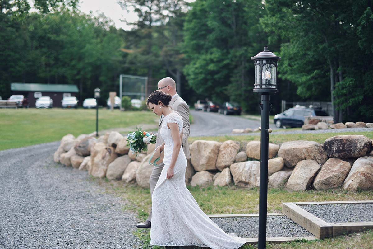 Bride and Groom walking to venue